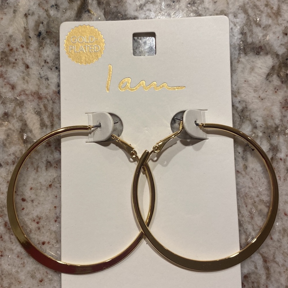 Gold plated hoop earrings. About 1 3/4 in across NWT